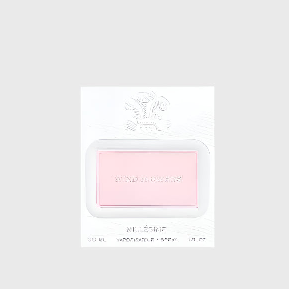 Pink spray bottle labeled 'Wind Flowers' in a white packaging on a light gray background