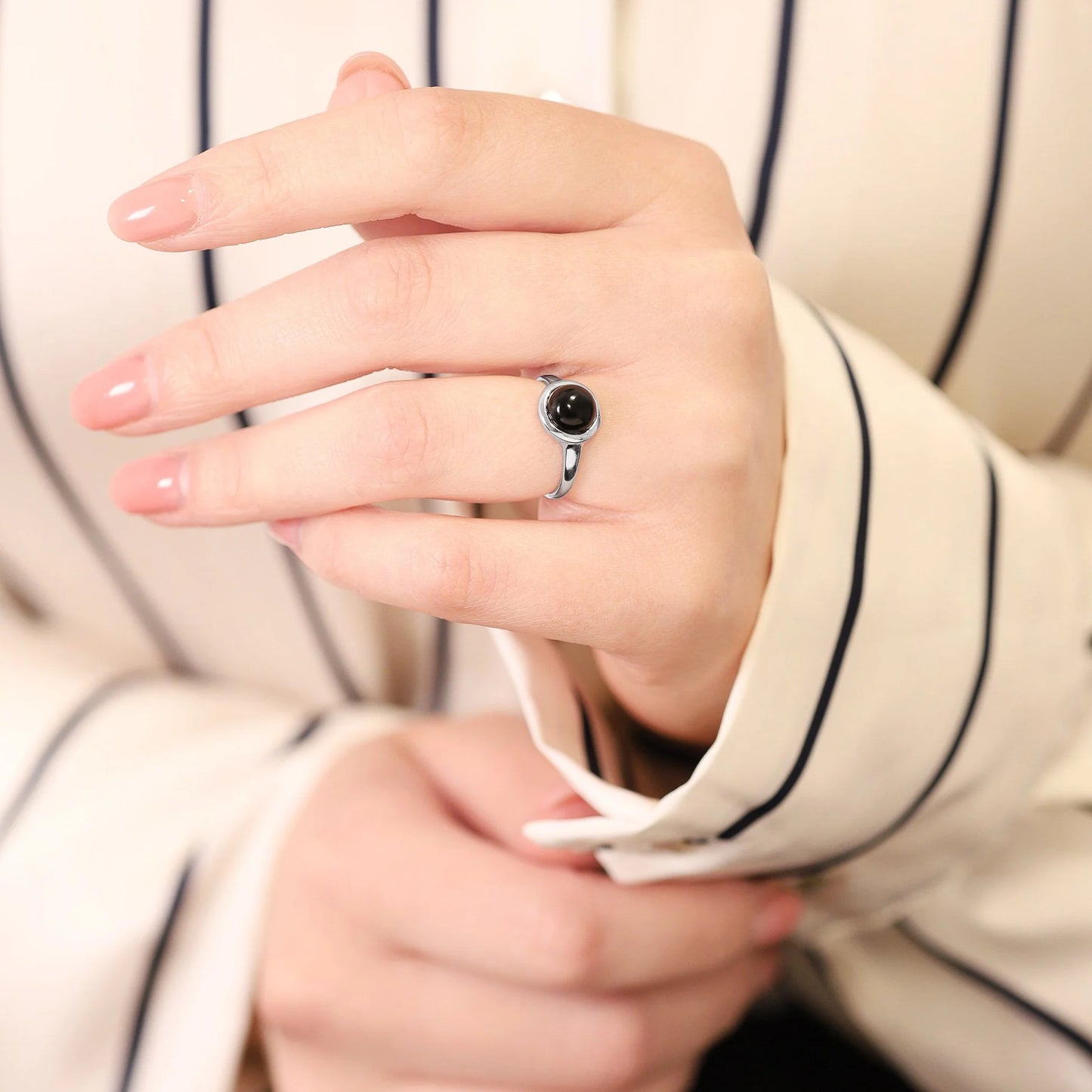 Silver rhodium plated ring with black onyx stone