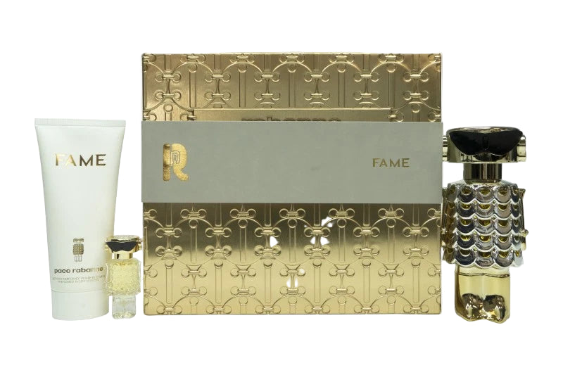 Perfume set with gold and white packaging on a white background