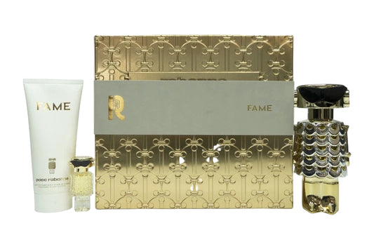 Perfume set with gold and white packaging on a white background