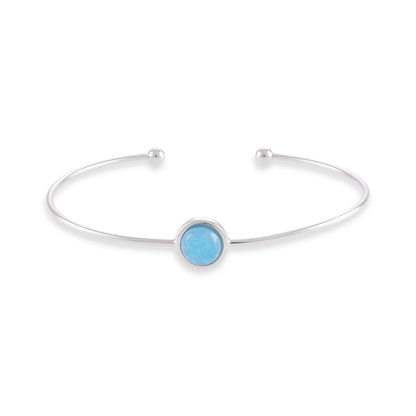 Silver rhodium plated bangle with blue quartz